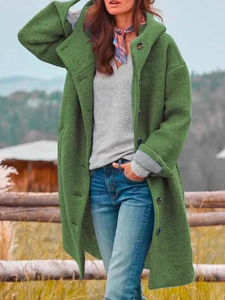 Warm soft wool coat combining comfort with refined feminine appeal