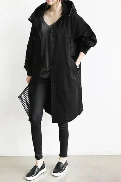 Breathable women's rain jacket designed for wet urban weather