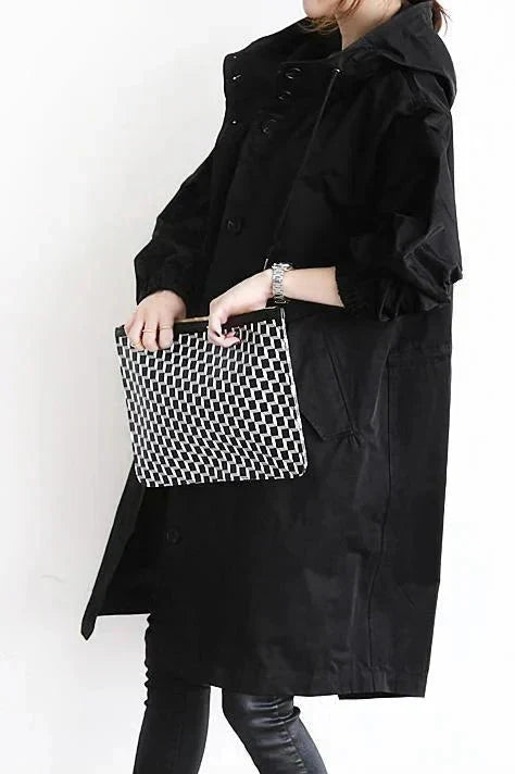 Elizabeth raincoat featuring practical hood coverage and comfortable fabric - black