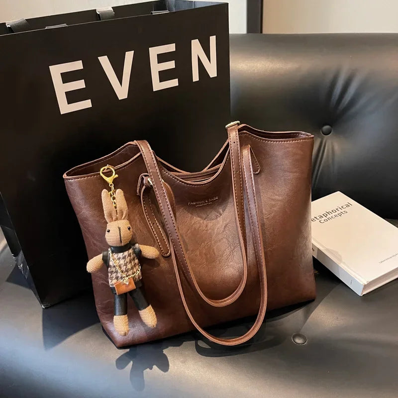Emma Rustic Edge Tote – Spacious Vintage Vegan Leather Tote with Fancy Pendant