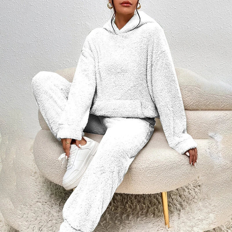 Soft winter loungewear featuring loose-fitting pants and a comfortable hood