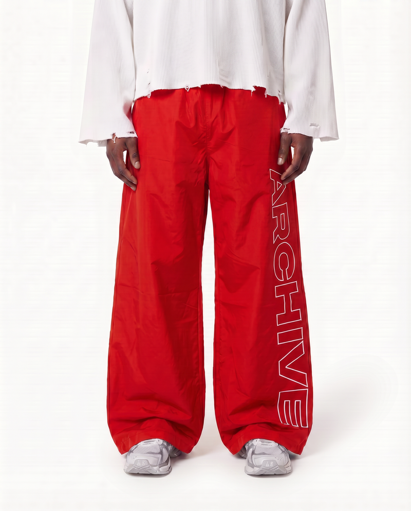 ARCHIVE 'STATEMENT' NYLON PANTS - RED