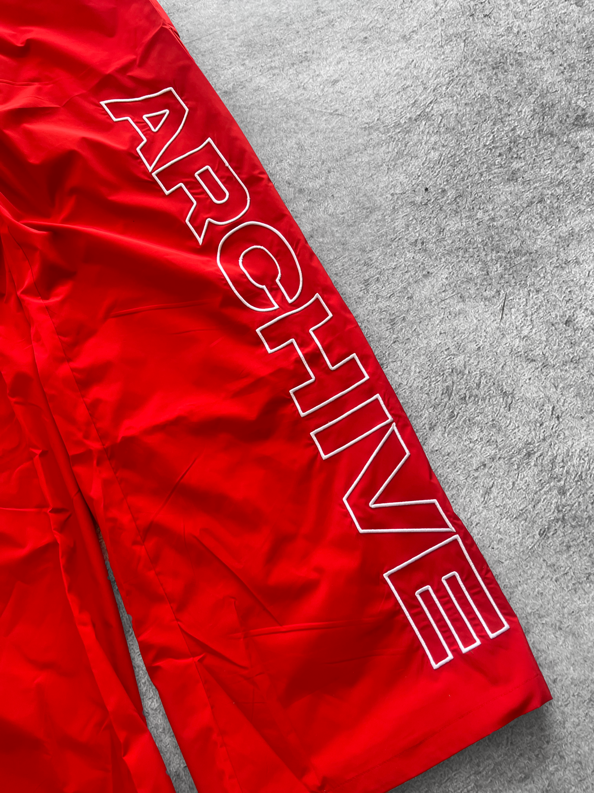 ARCHIVE 'STATEMENT' NYLON PANTS - RED