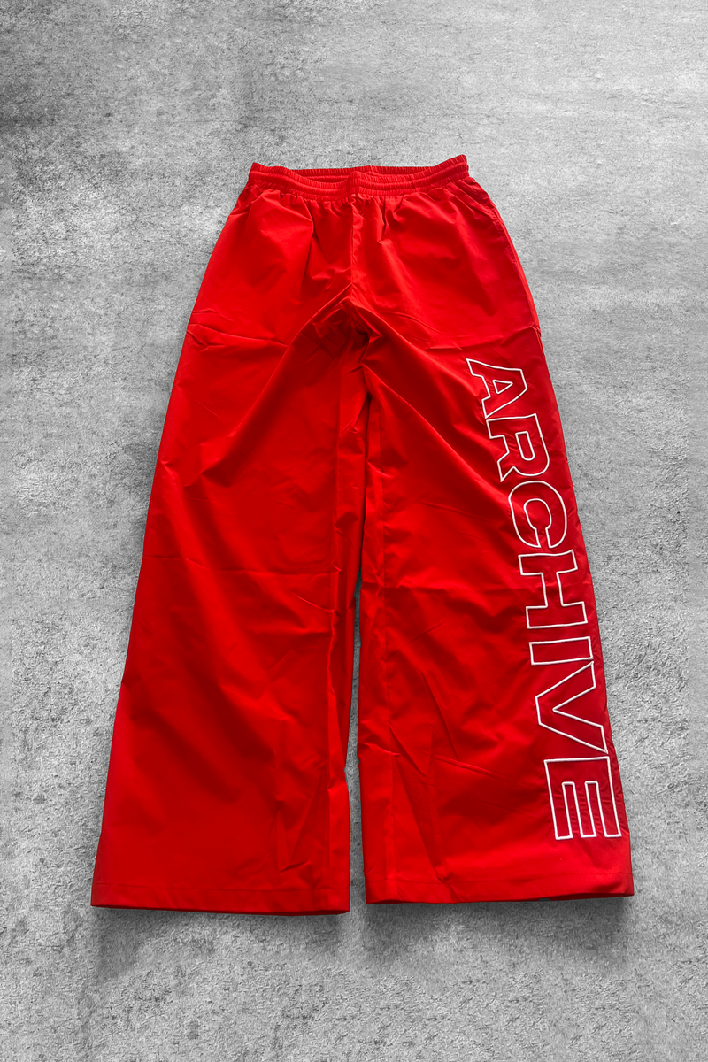 ARCHIVE 'STATEMENT' NYLON PANTS - RED